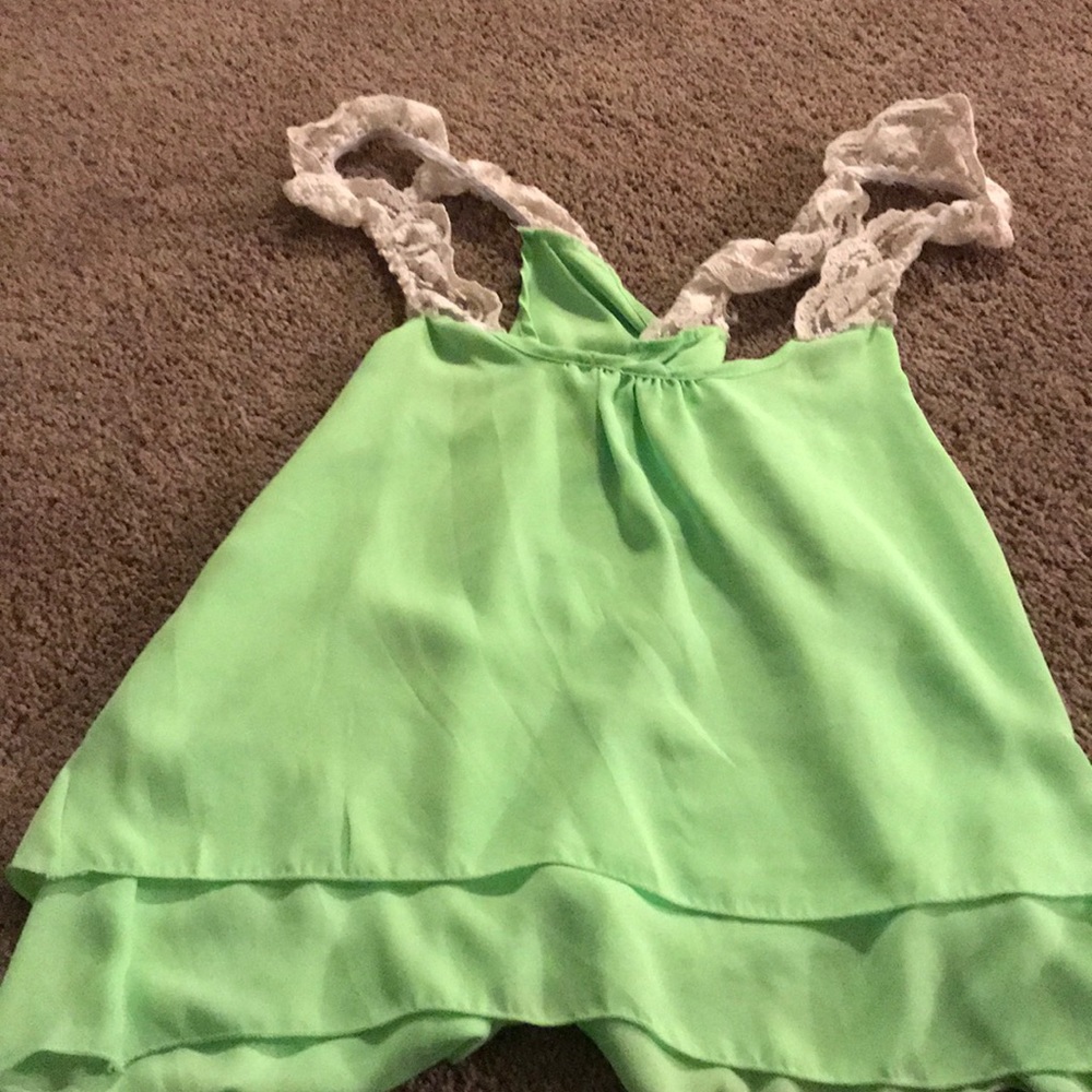 A cris Cross lime green tank top